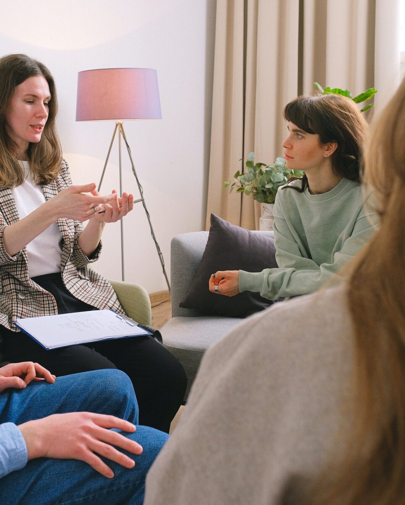 Group counselling with people sitting around each other